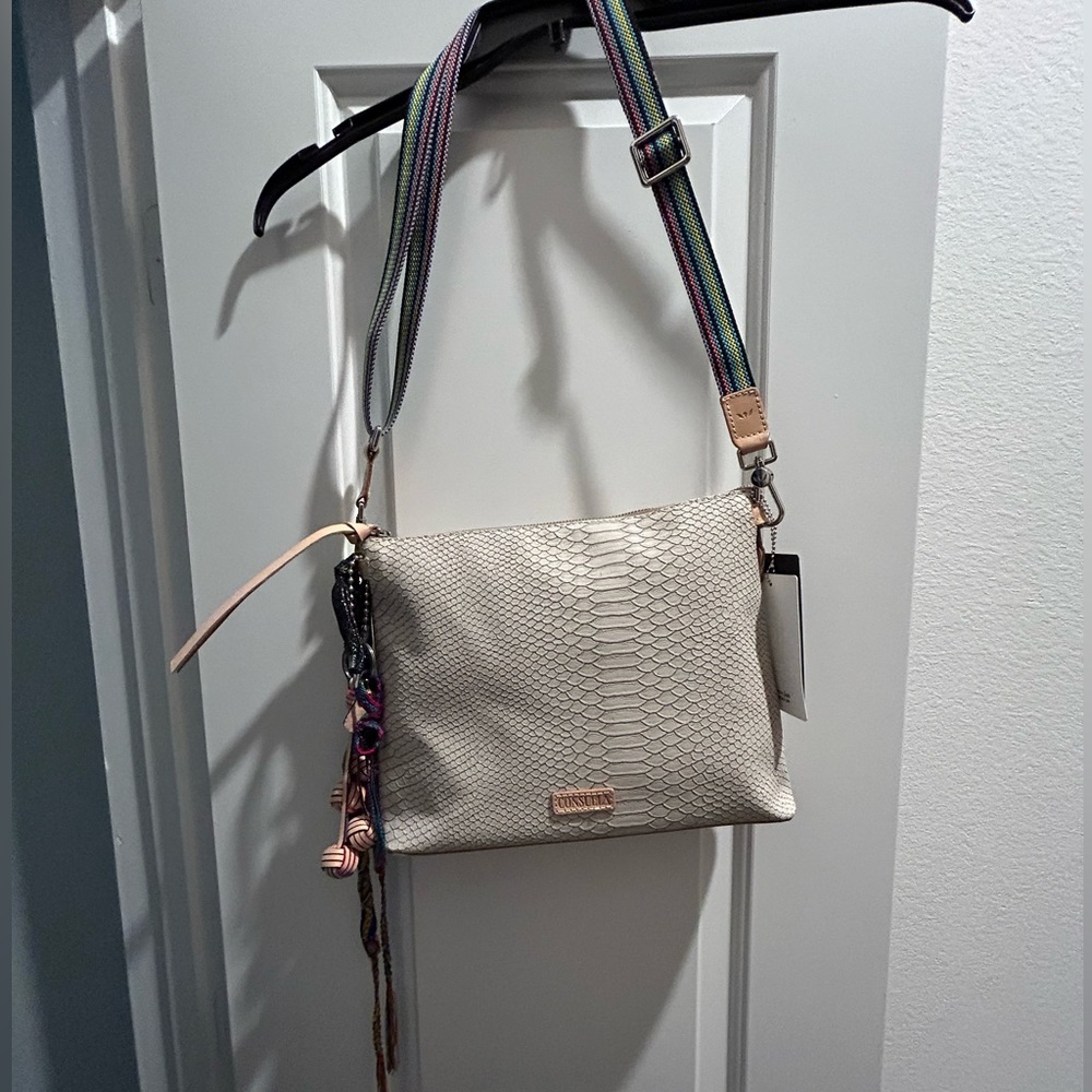 NWT Consuela Thunderbird crossbody with all the pretty hang tags. Never worn.